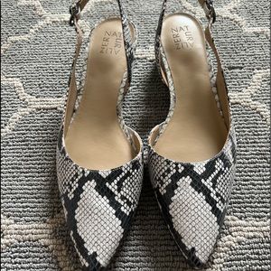 Black and white snakeskin slingbacks